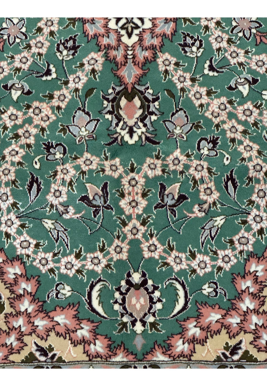 Close-up of intricate floral border design on Persian Isfahan rug