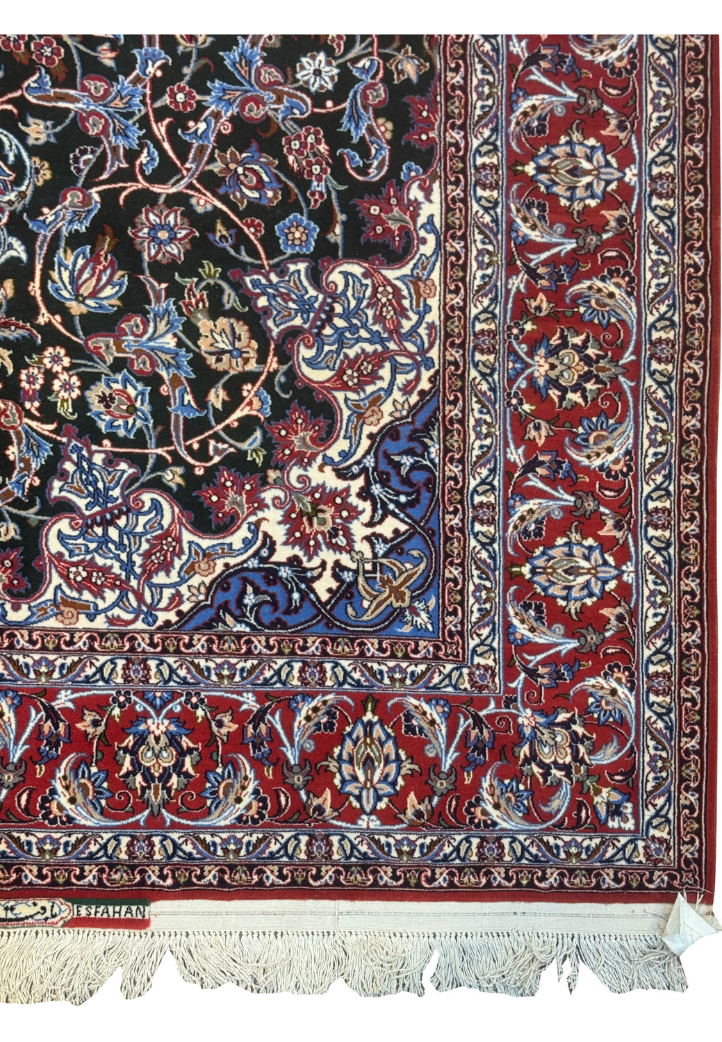 Intricate floral corner and border of signed Persian Isfahan Seirafian rug with crimson, ivory, and Persian blue details.