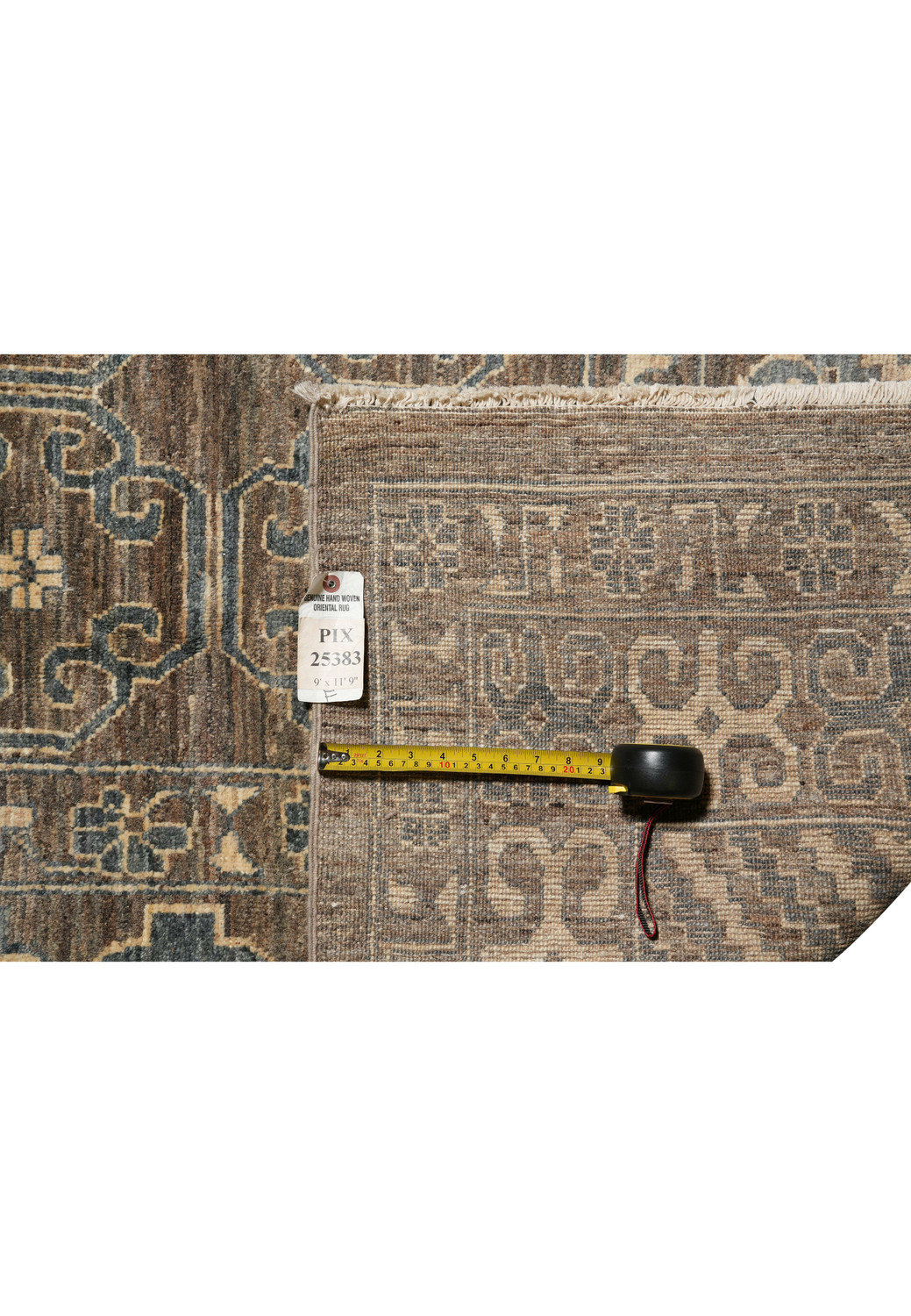 Zigler Transitional Rug backside showing hand-knotted wool weave, earthy grey-brown tones, and geometric border motifs.