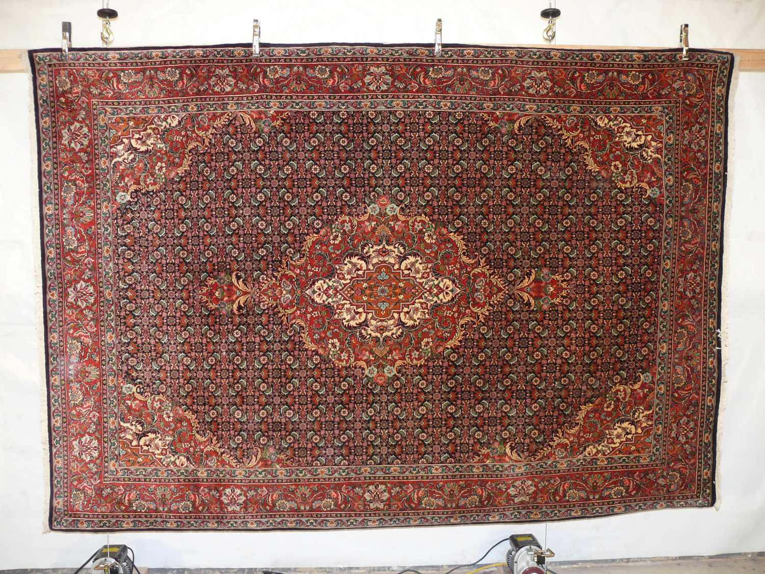 7 x 10 Bijar Persian Rug hanging and showing its whole beauty also call Iron Rug