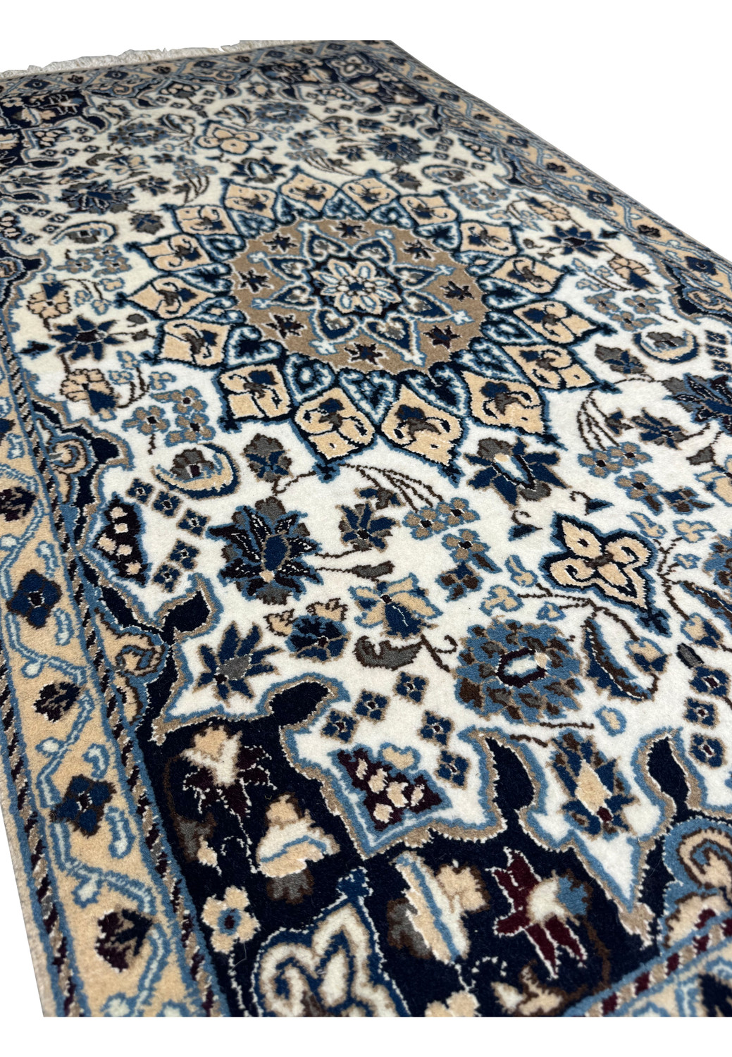 Angled view of 2'9 x 4'10" Ivory Nain Persian Rug showing pile and design depth.