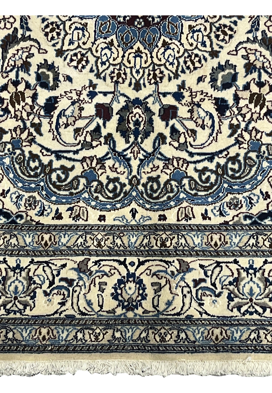 Lower edge of Square Nain Rug with ivory background, navy blue floral border, and silk highlights