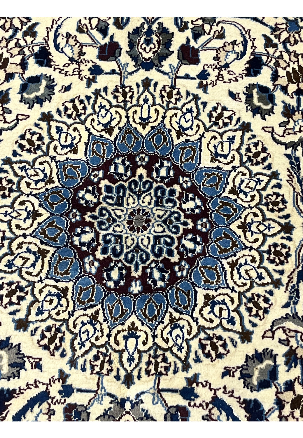 Zoomed medallion view of Square Persian Nain Rug highlighting silk accents in burgundy and blue