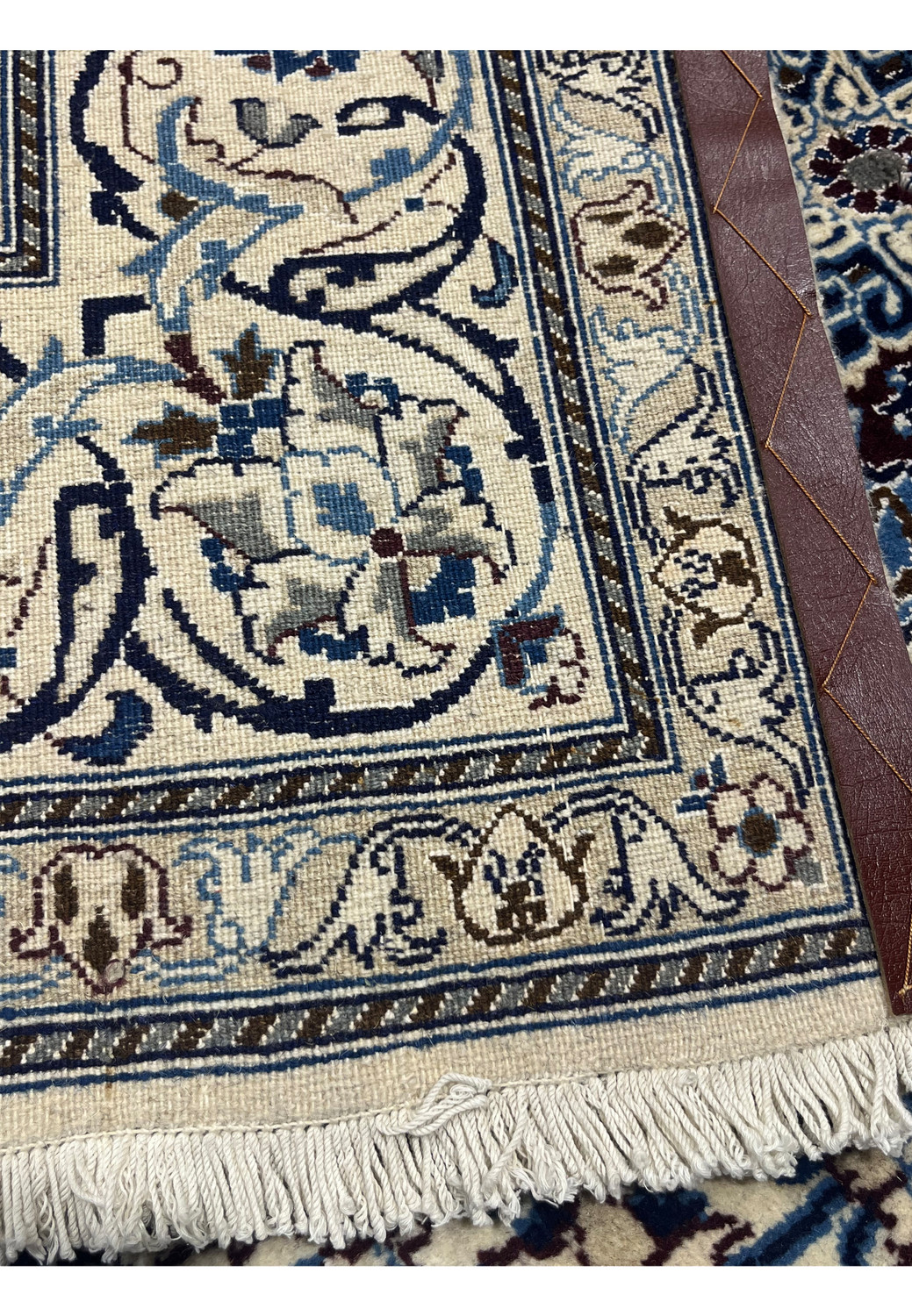 Backside of 6'7 x 6'7 Square Persian Nain Rug showing fine knot density, ivory foundation, and hand-knotted craftsmanship