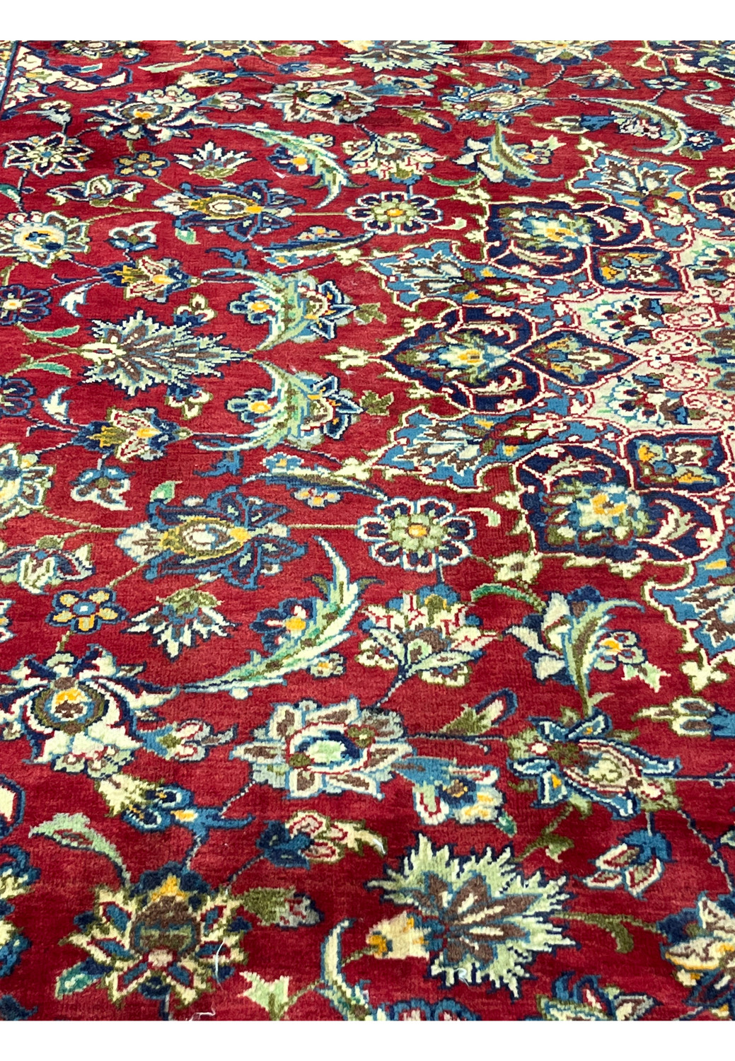 Color close-up showing texture and wool pile of Isfahan Persian rug