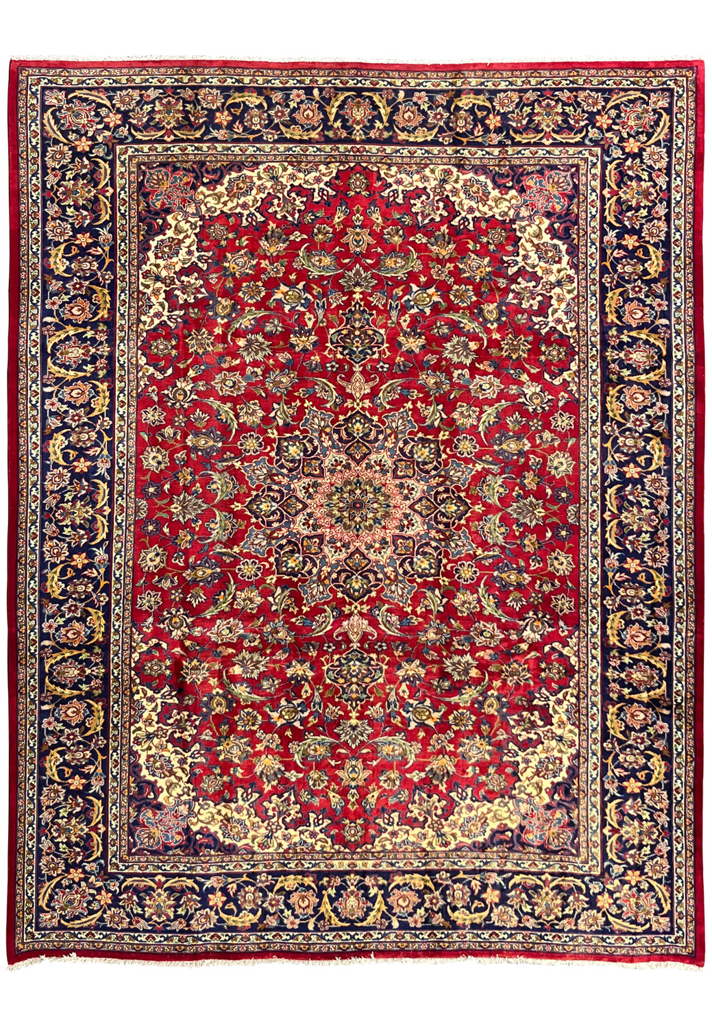 Full view of 9'6 x 12 Persian Isfahan rug with red field and navy floral border