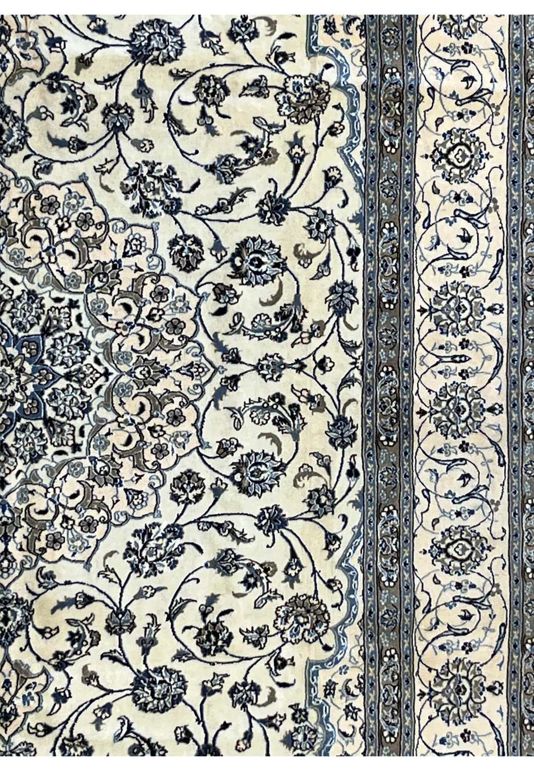 Side border of 10' x 13'2 Persian Nain 9LA Rug featuring scrolling vines, blue rosettes, and contrasting ivory ground.