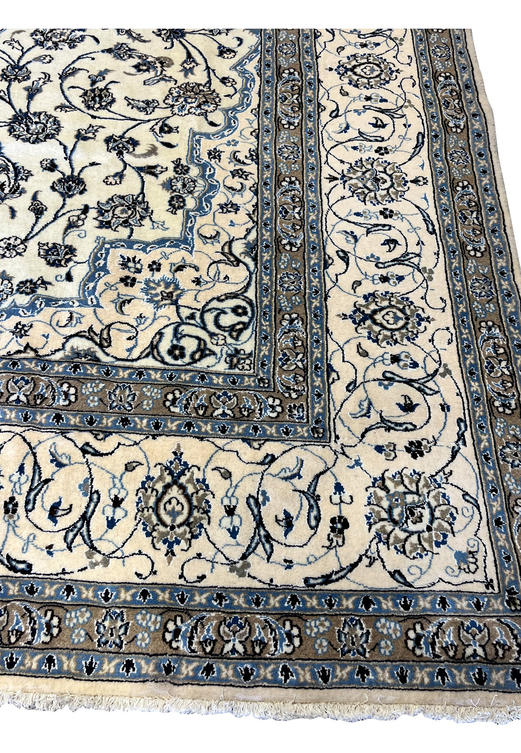 Folded edge of 10x13 Persian Nain 9LA Rug revealing border design, fine knot density, and shimmering silk highlights.