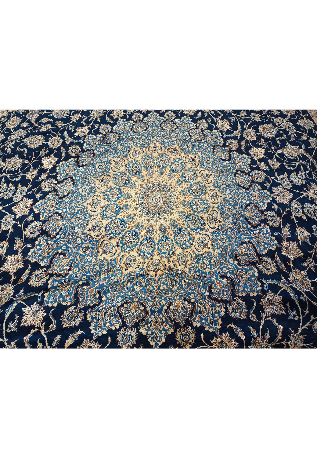 Close-up of 14x25'6 Nain 9 LA Persian rug medallion with silk highlights and intricate pattern.