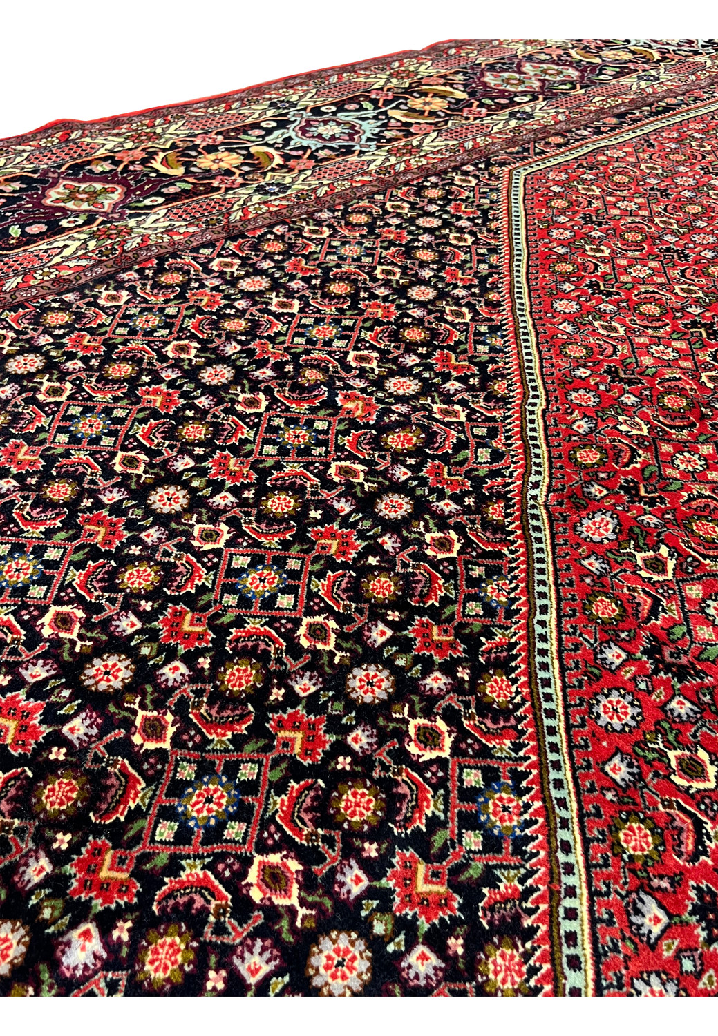 10x13 Bijar Persian Iron Rug field detail with bold red background and floral medallion geometry