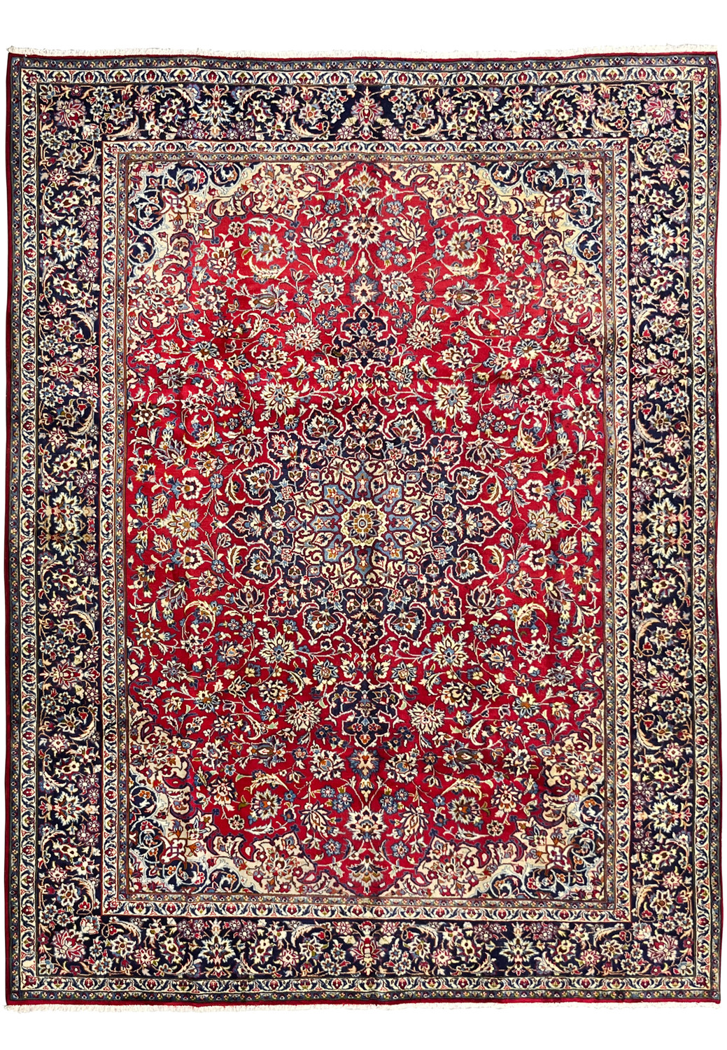 9'10 x 13'1 Persian Isfahan rug full view showing ruby red field, navy borders, floral motifs, and detailed central medallion