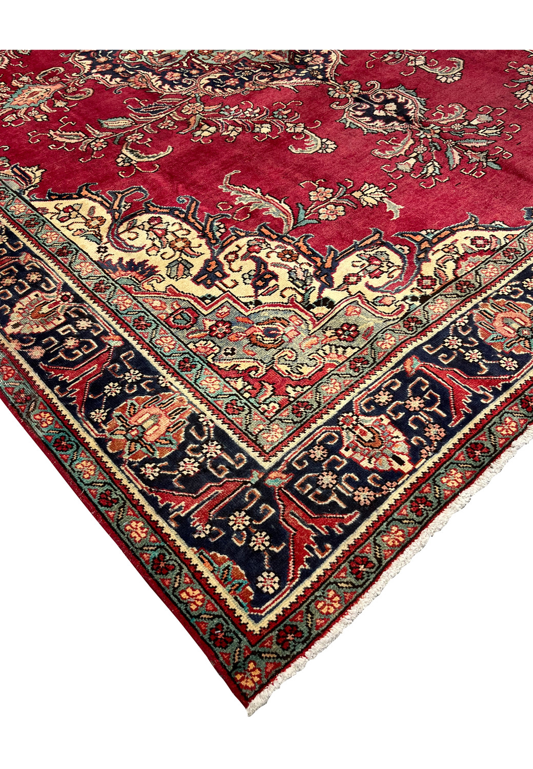 Edge close-up of the Patina Persian Tabriz Rug showing worn pile, border motifs, and texture variation.