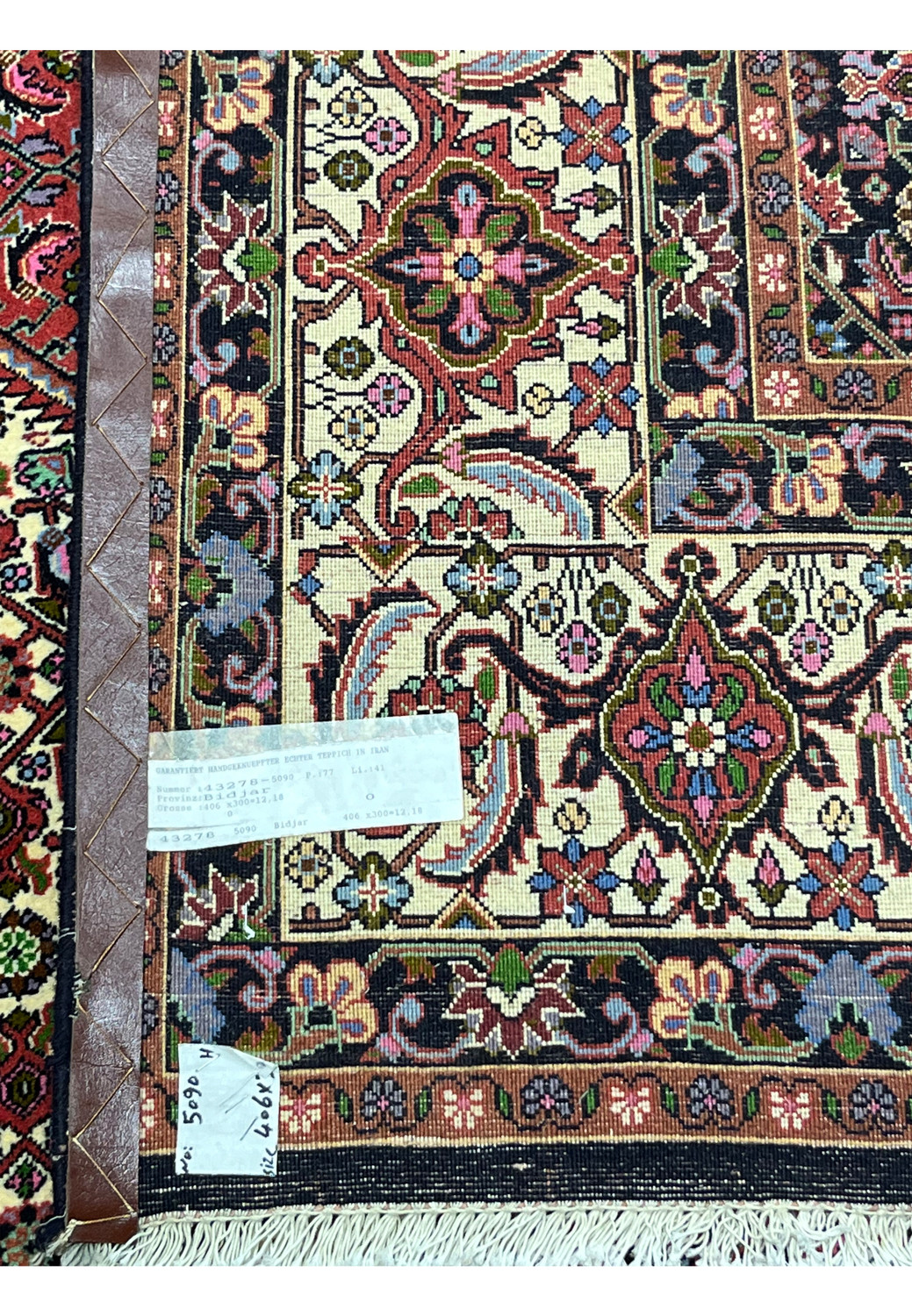 Full back view of rare size Persian Bijar iron rug displaying uniform knot structure and heavy handwoven foundation