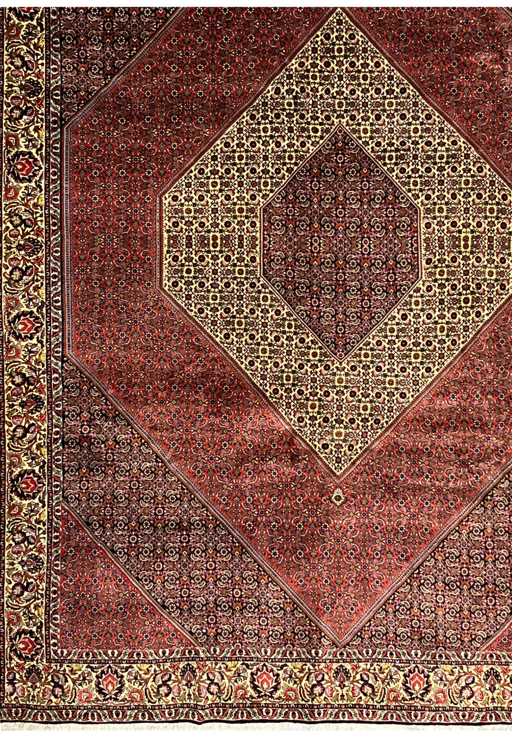 Lower field section of Persian Bijar rug with angular panel layout