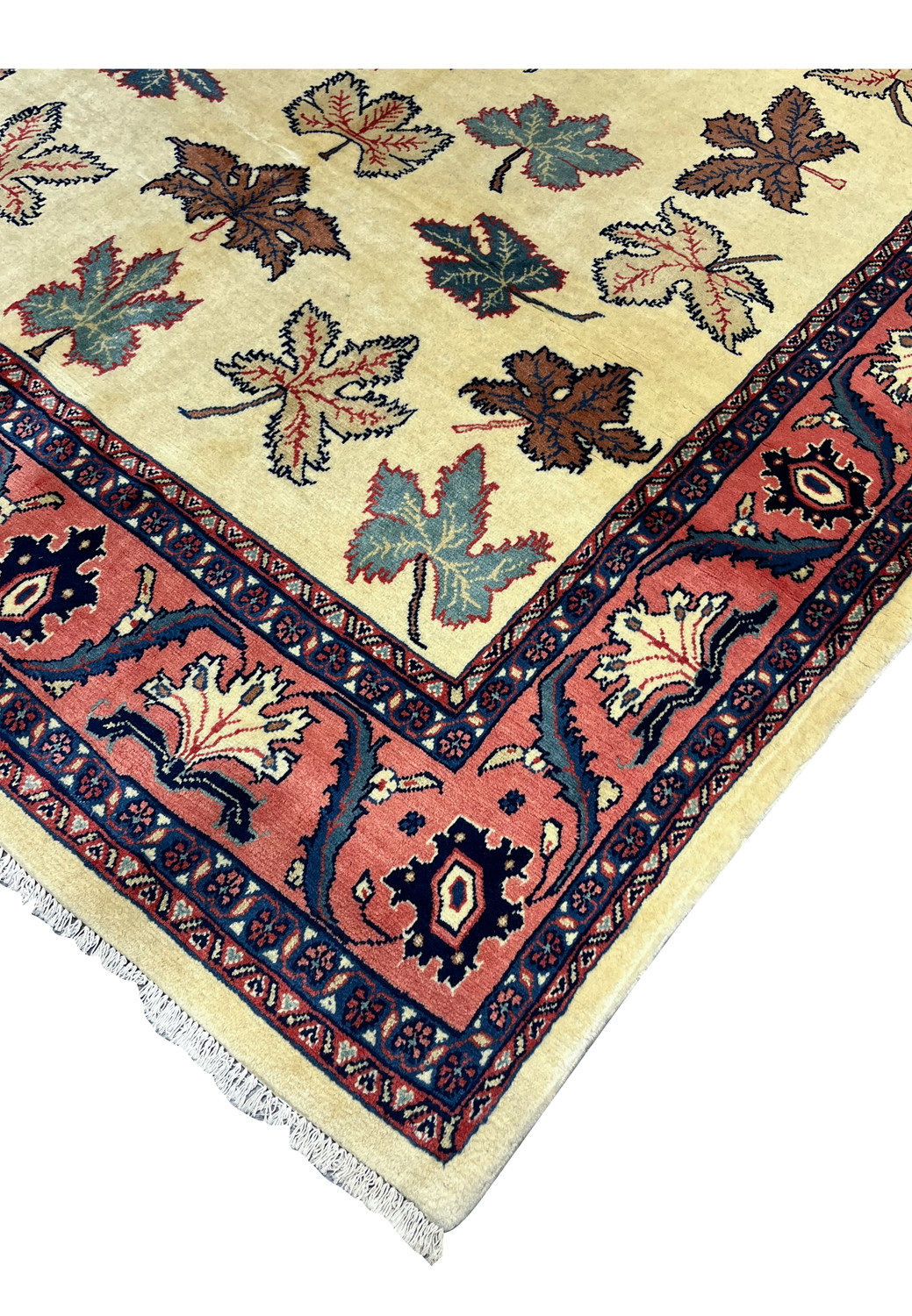 Edge and fringe detail of a hand knotted Persian Farahan rug showing wool pile and cotton foundation