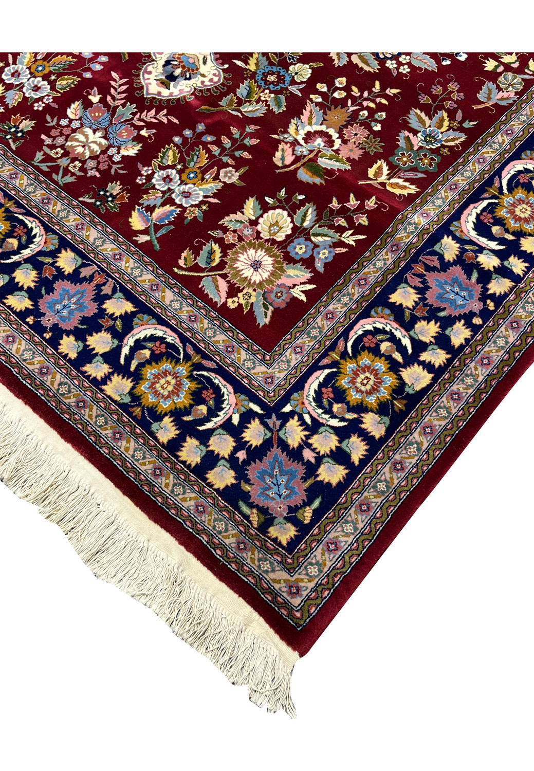 Edge and fringe detail of Persian Isfahan wool and silk rug showing clean finishing