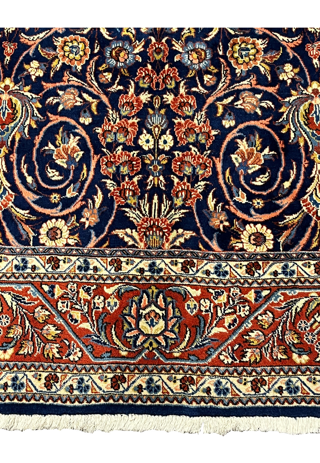 Close-up of red and ivory floral border on Persian Sarough rug