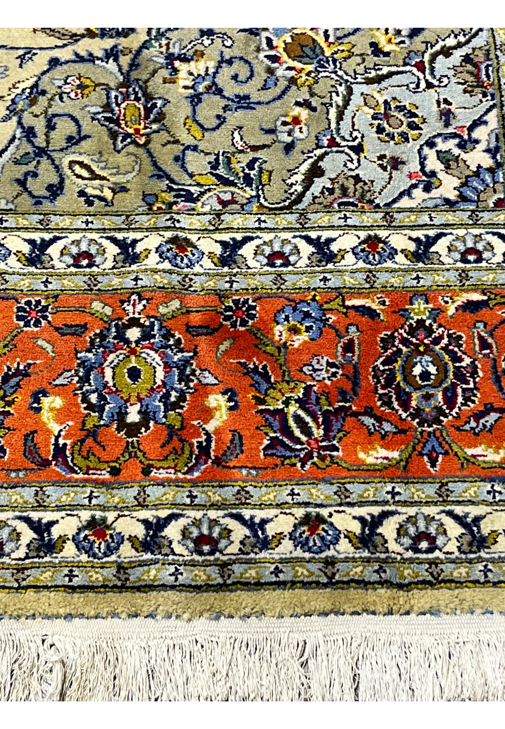 Border close-up showing layered guard borders and traditional Kashan floral design