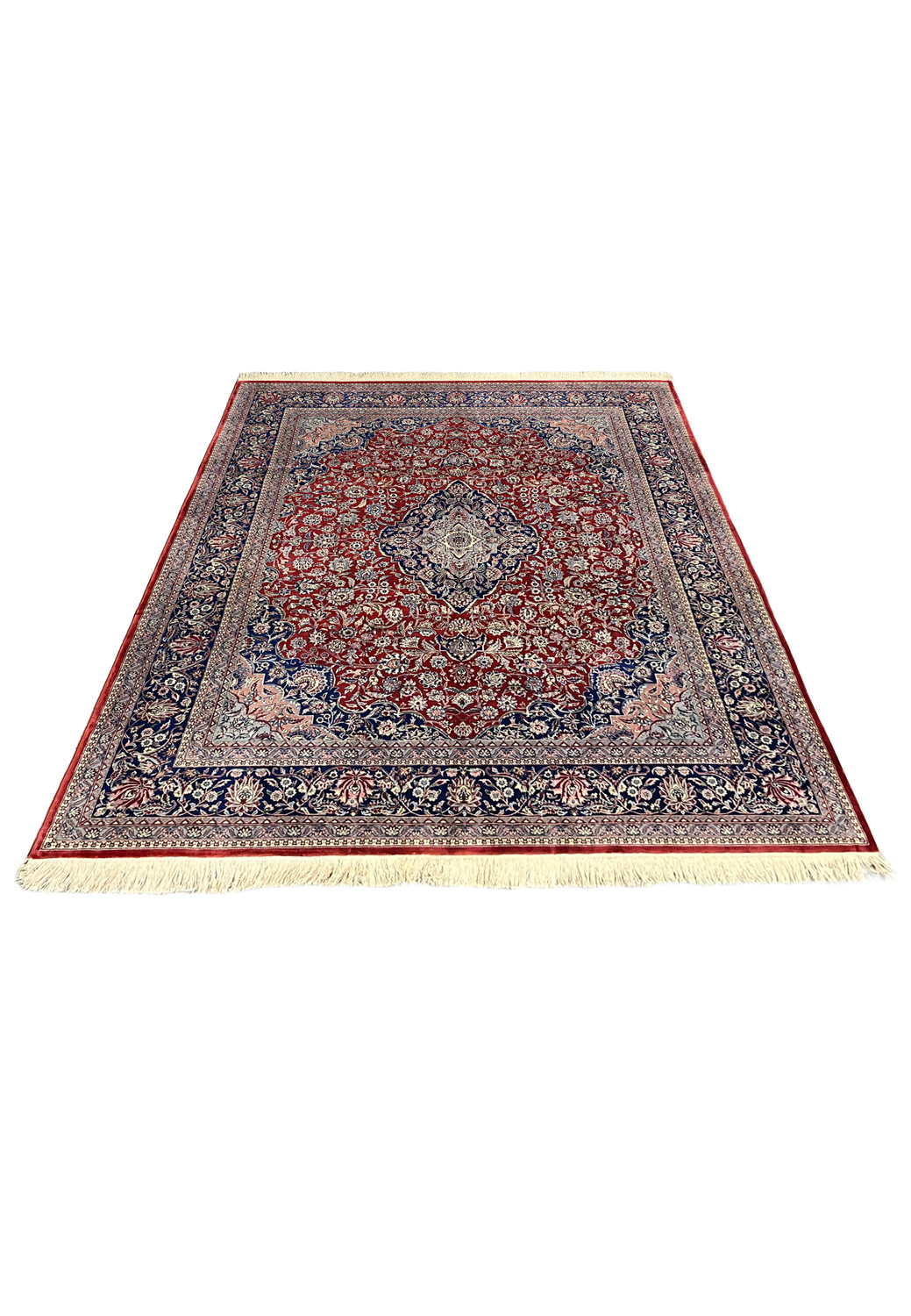 Perspective view of antique Persian Kashan rug showing depth and symmetry