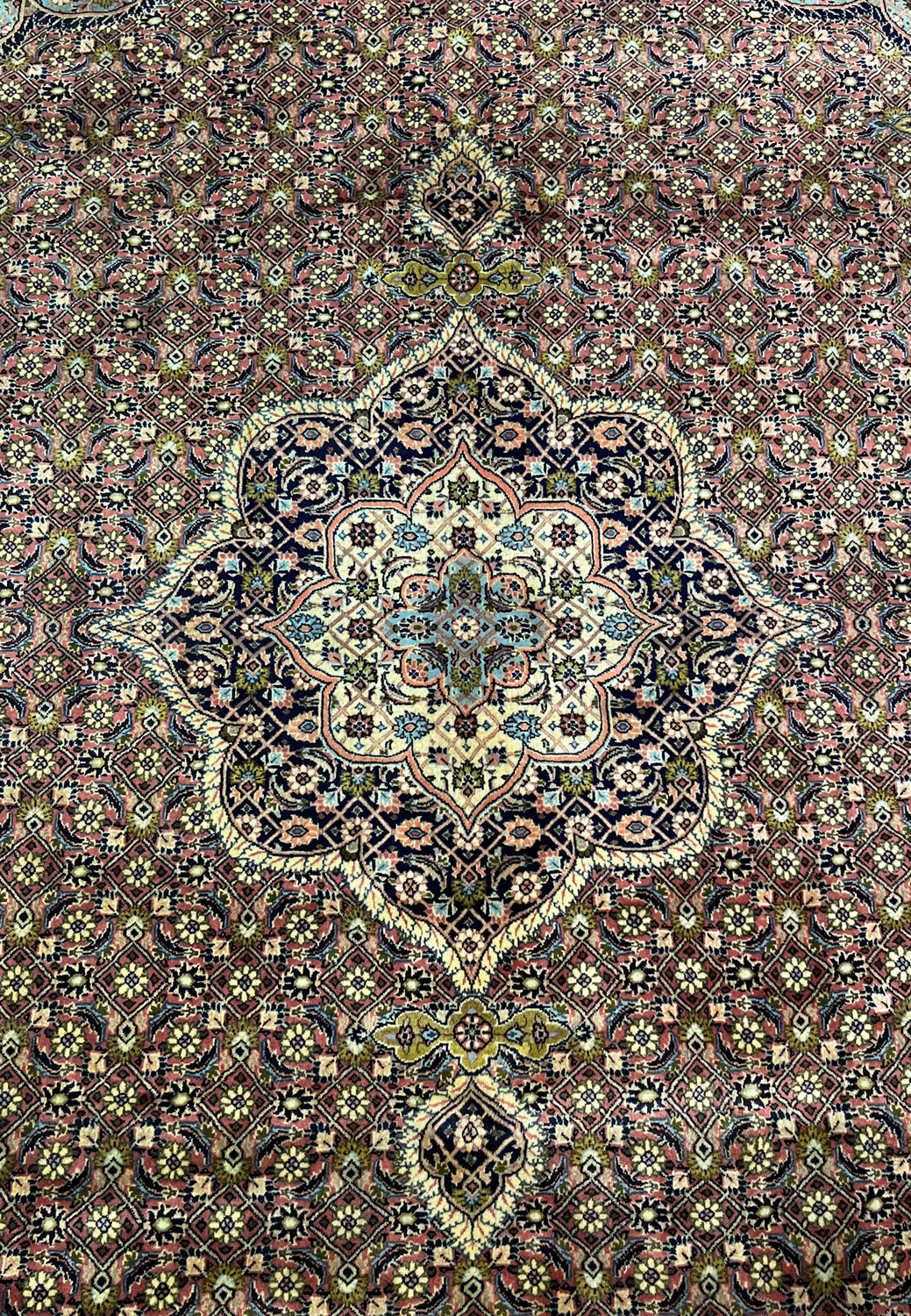 Close-up of medallion on Persian Bijar iron rug showing crisp outlines and dense wool pile