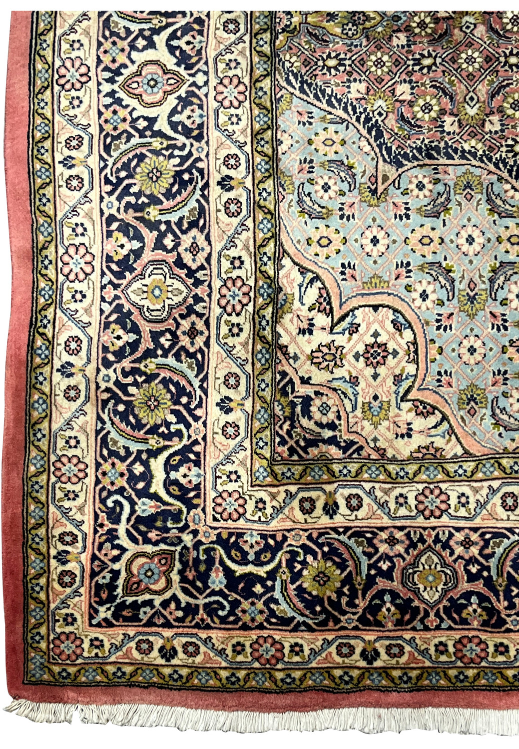 Wide border detail of Persian Bijar iron rug showing navy ground with floral medallions and precise hand-knotted outlines