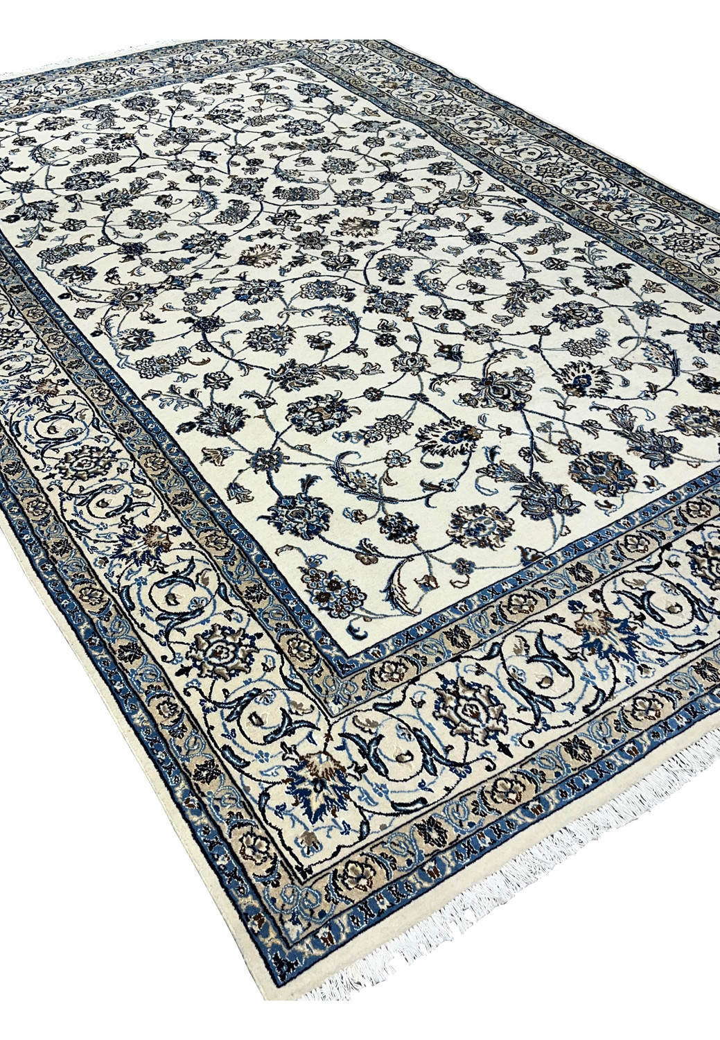 Angled perspective view of Persian Nain 9 LA rug showing pile texture and design depth