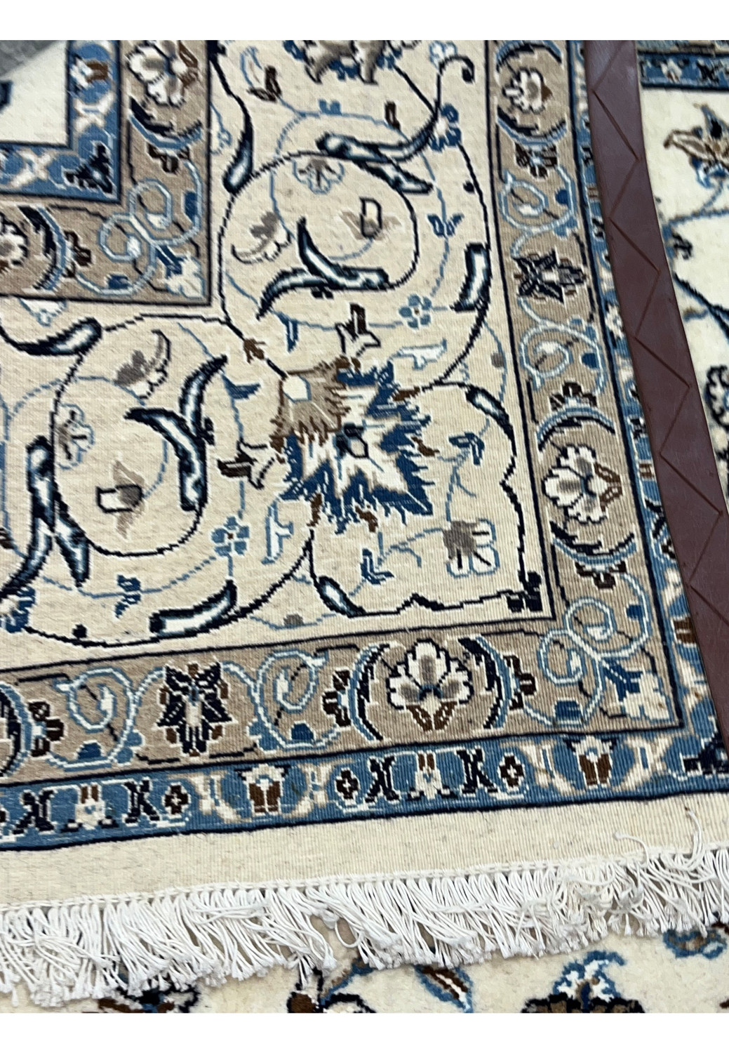 Reverse side of Persian Nain 9 LA rug revealing tight knot rows and clean wool and silk foundation