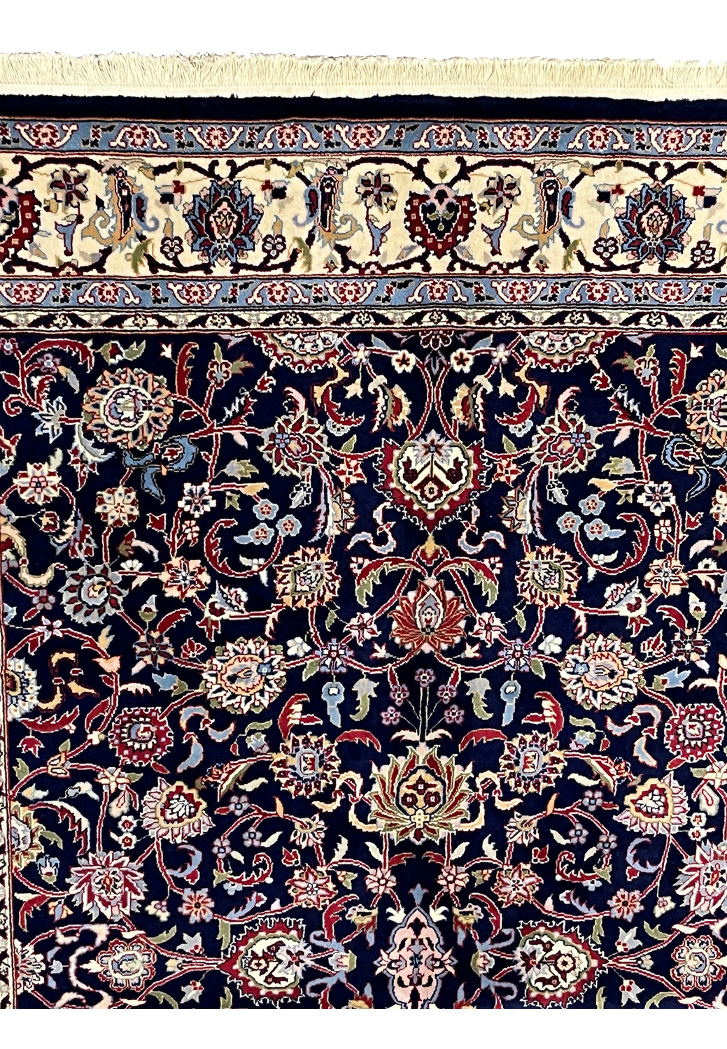 Upper border detail of Persian Sarough rug showing ivory ground with repeating floral motifs