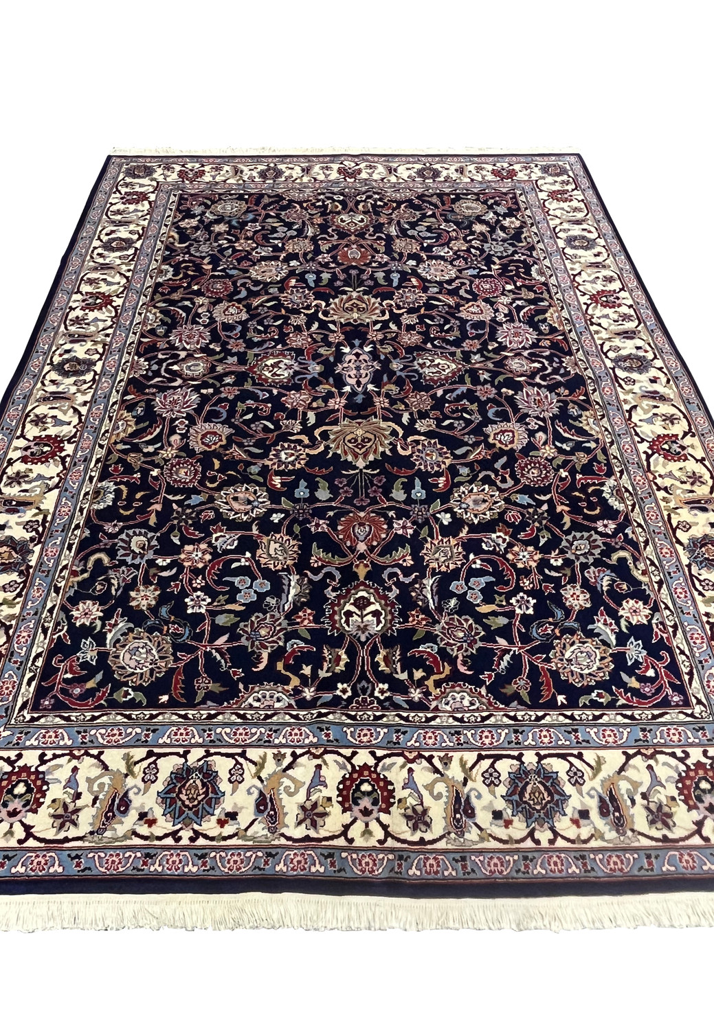 Top view of Persian Sarough rug showing symmetrical allover floral composition
