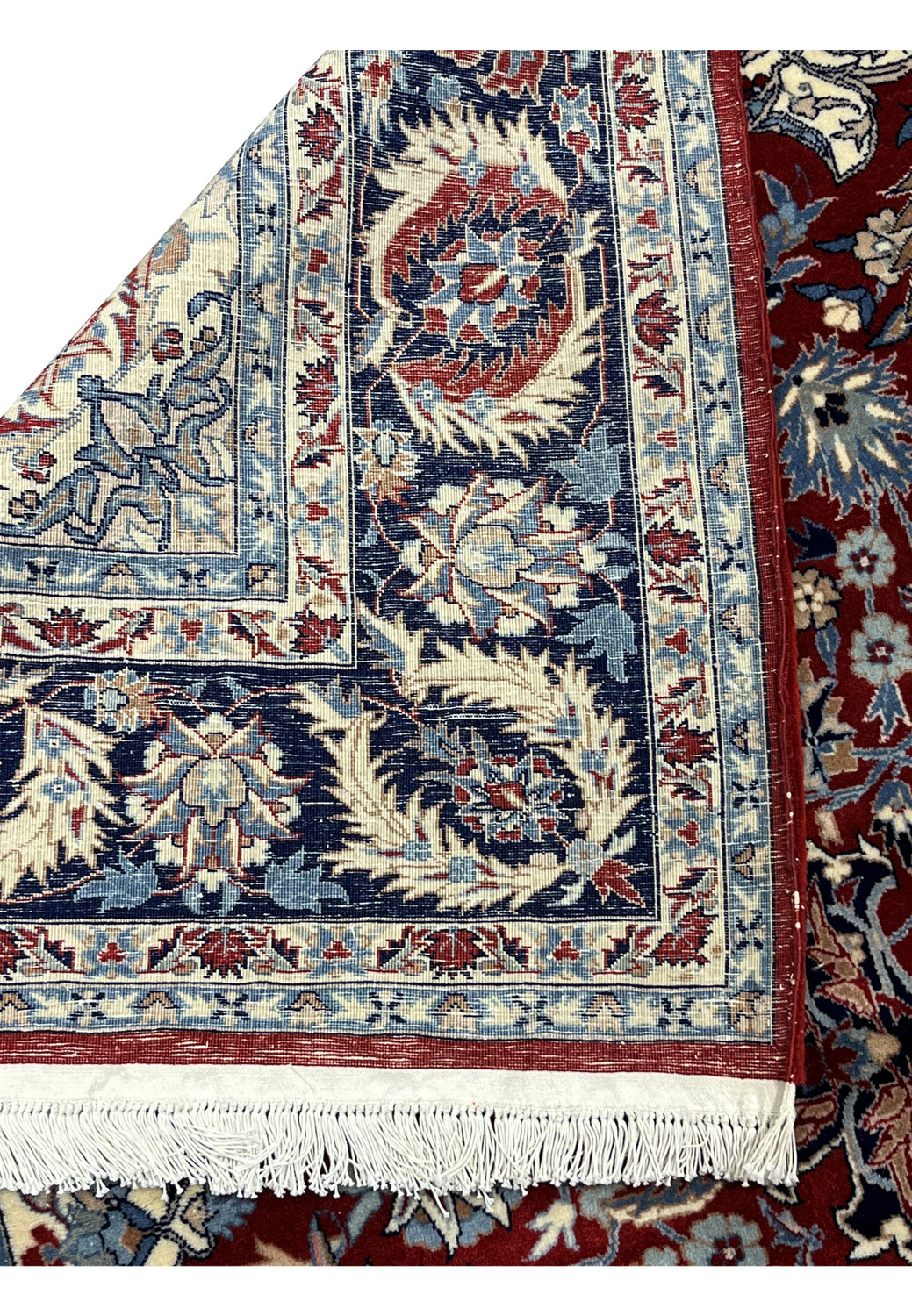 Backside view of hand-knotted Persian Tabriz rug displaying uniform knots, wool foundation, and consistent craftsmanship