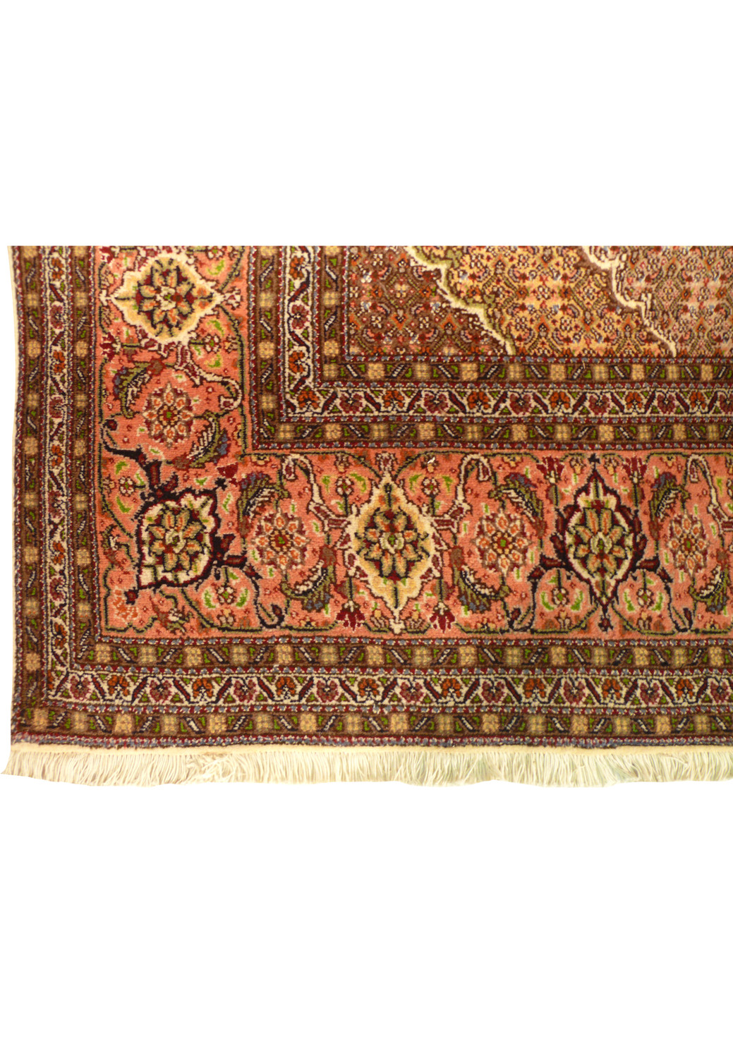 Border detail of Persian Tabriz Mahi rug featuring floral palmettes and warm tones