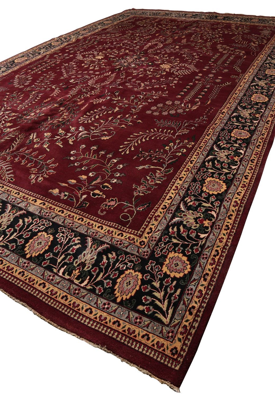 Angled perspective highlighting scale and presence of large Sarough rug