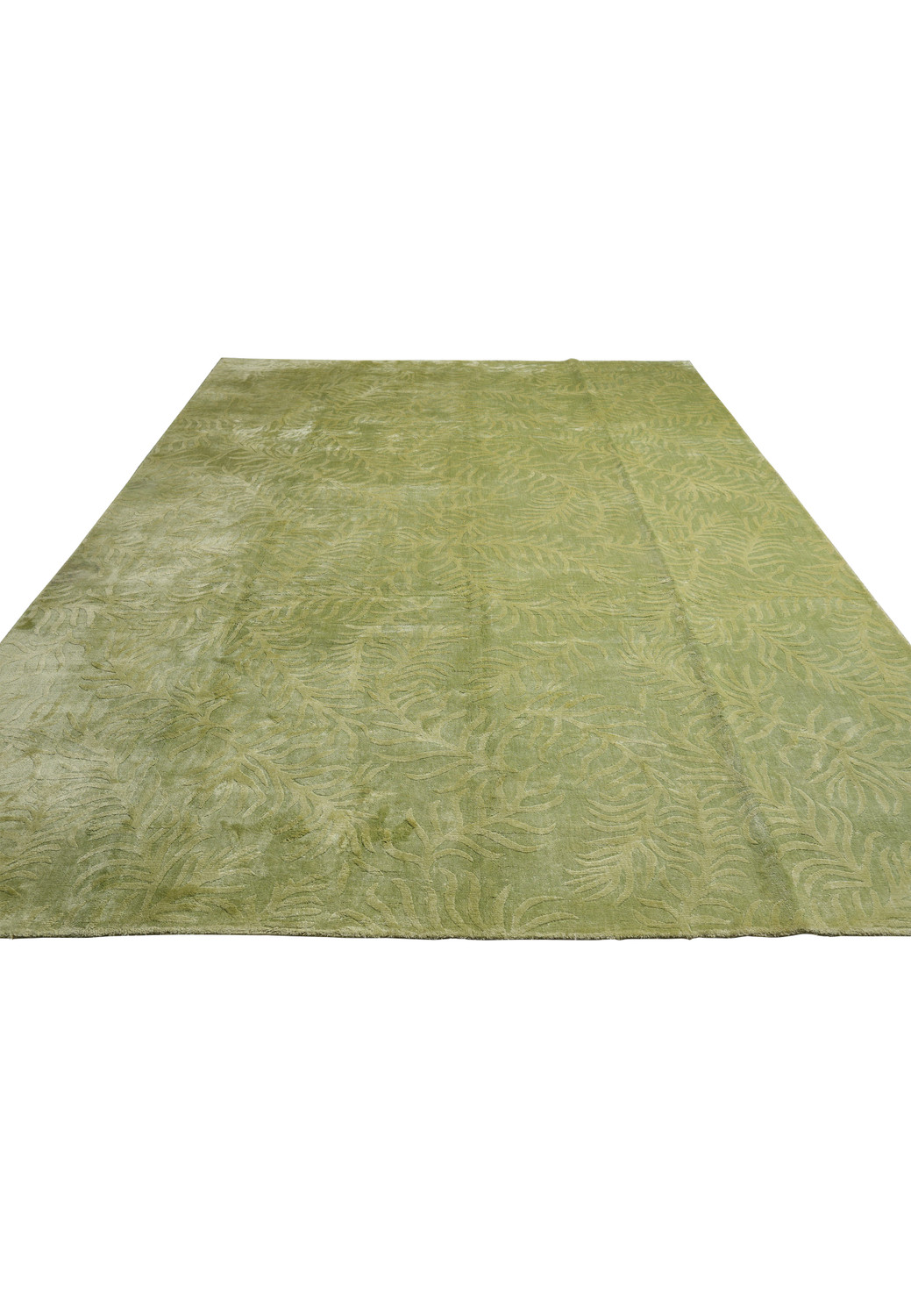 Laid-down view illustrating the full scale, soft color variation, and organic movement of this olive sage green area rug.