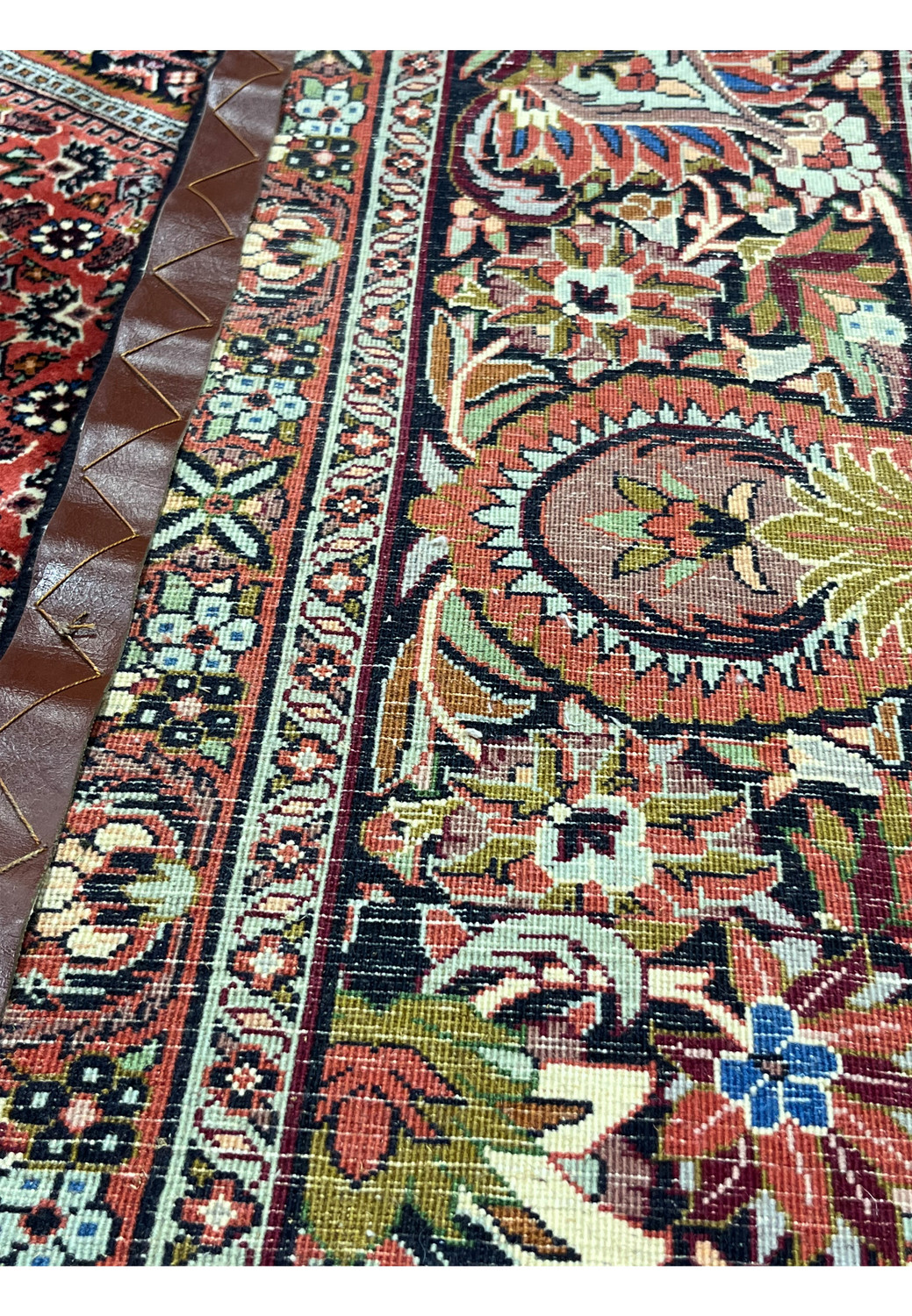 Zoomed backside detail highlighting dense knots and strong foundation typical of Persian Bijar iron rugs