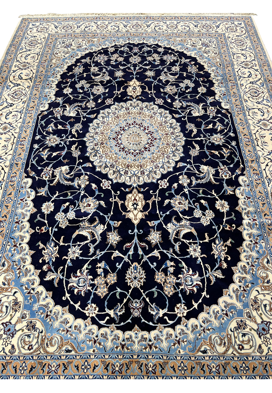 Detailed view of Persian Nain silk rug midfield featuring scrolling vines, floral motifs, silk accents, and balanced spacing on deep navy background