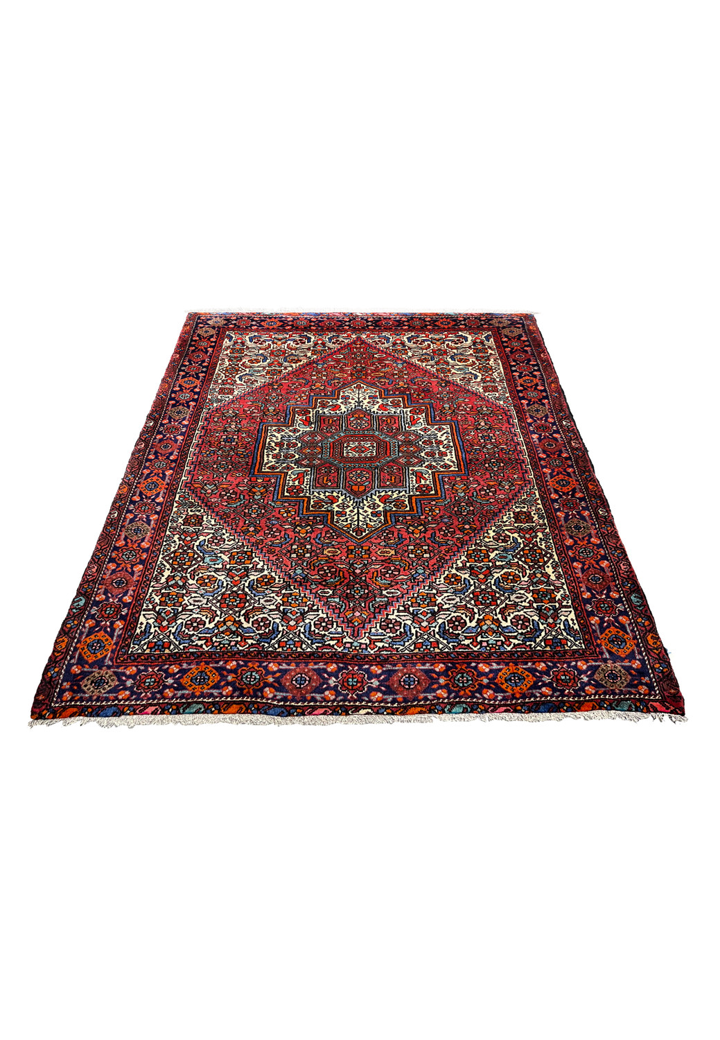 Persian Gholtogh rug laid flat displaying its structured geometric medallion, dense wool pile, red field, crisp ivory detailing, and symmetrical border layout