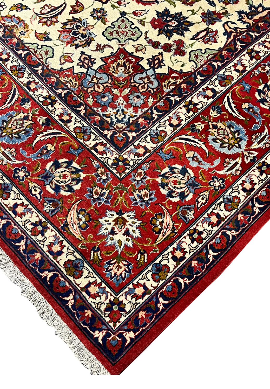 Edge view of a handmade Persian Isfahan rug highlighting even pile height, tight knot structure, and clean transitions between border and field