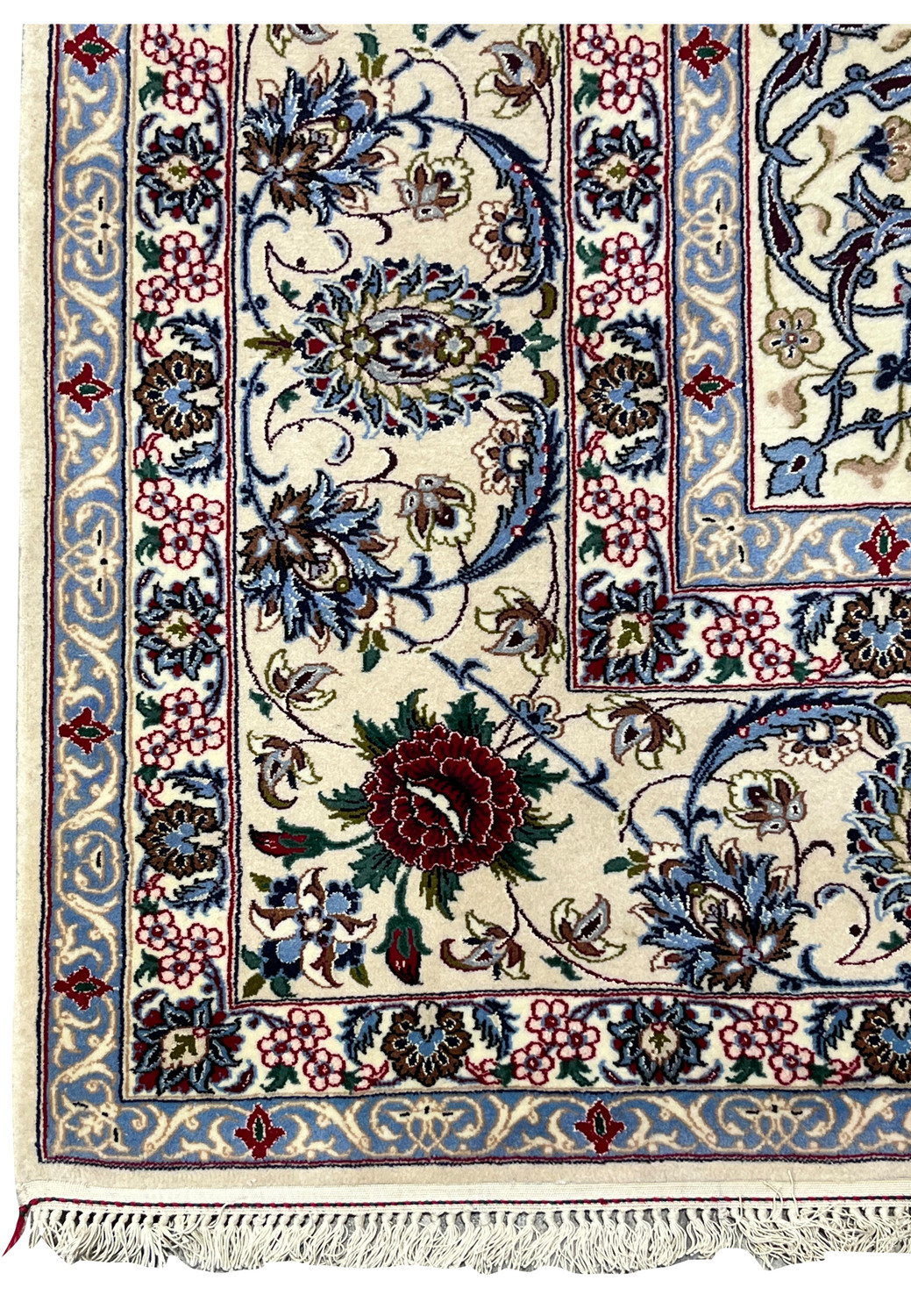 Persian Isfahan rug border featuring layered floral bands in ivory, sky blue, burgundy red, navy, and soft beige with precise wool and silk detailing
