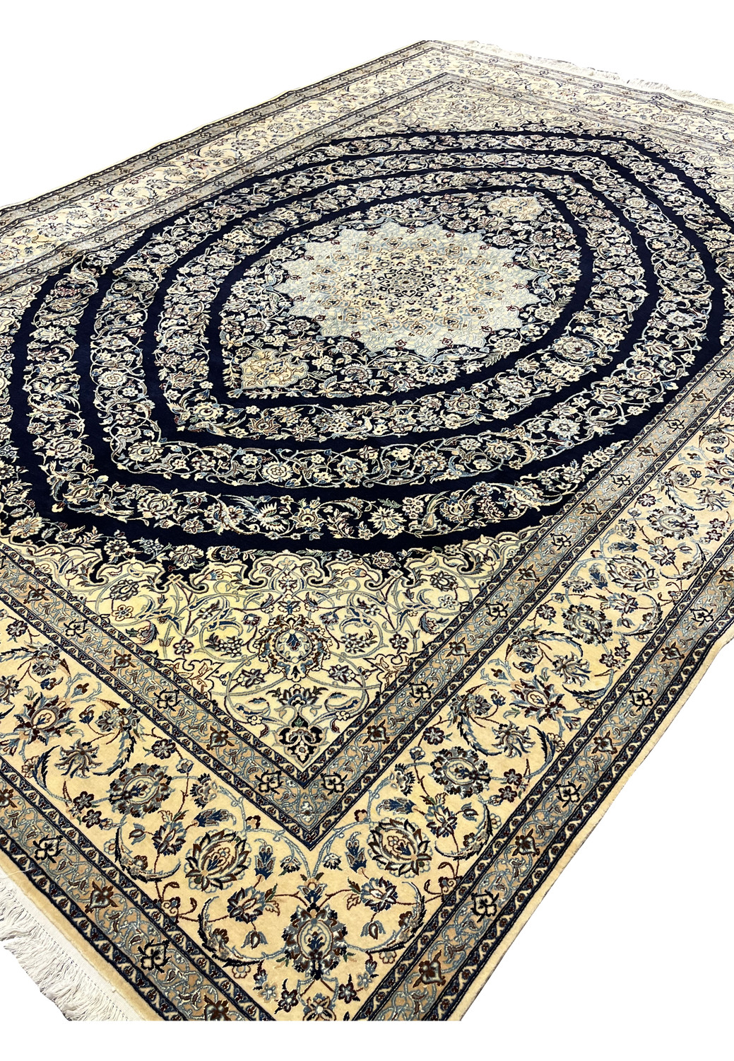 Side perspective of Persian Nain 6 La rug showing pile height, silk luster, and finely woven kork wool surface
