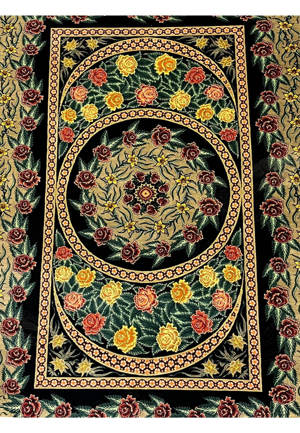 Midfield detail of a Persian Qum pure silk rug highlighting layered oval medallions, dense floral motifs, and sharp silk definition against a deep black ground