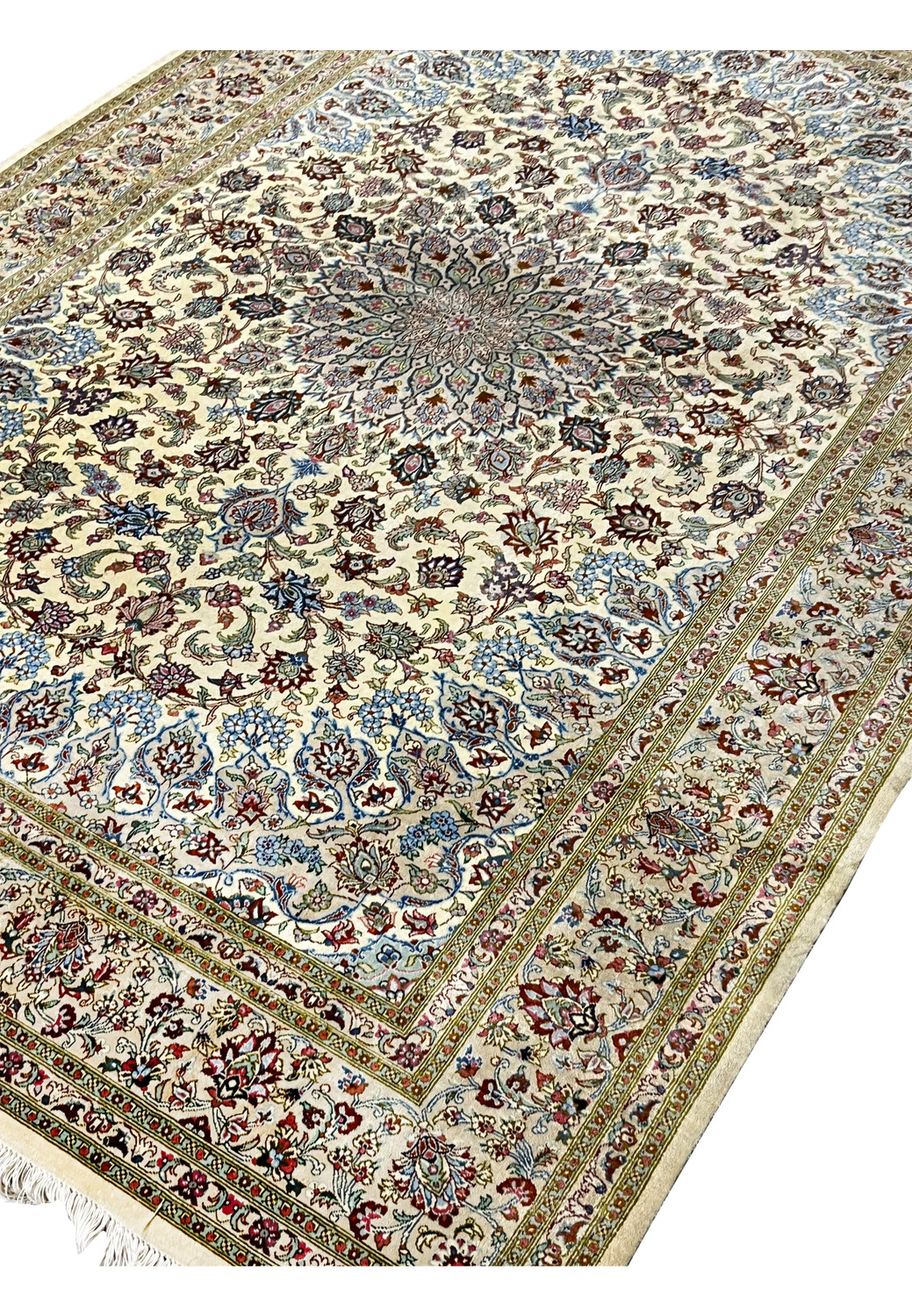 Angled perspective of a 4'5 x 6'7 signed Persian Qum silk rug highlighting dimensional depth, medallion symmetry, and the natural sheen of pure silk fibers.