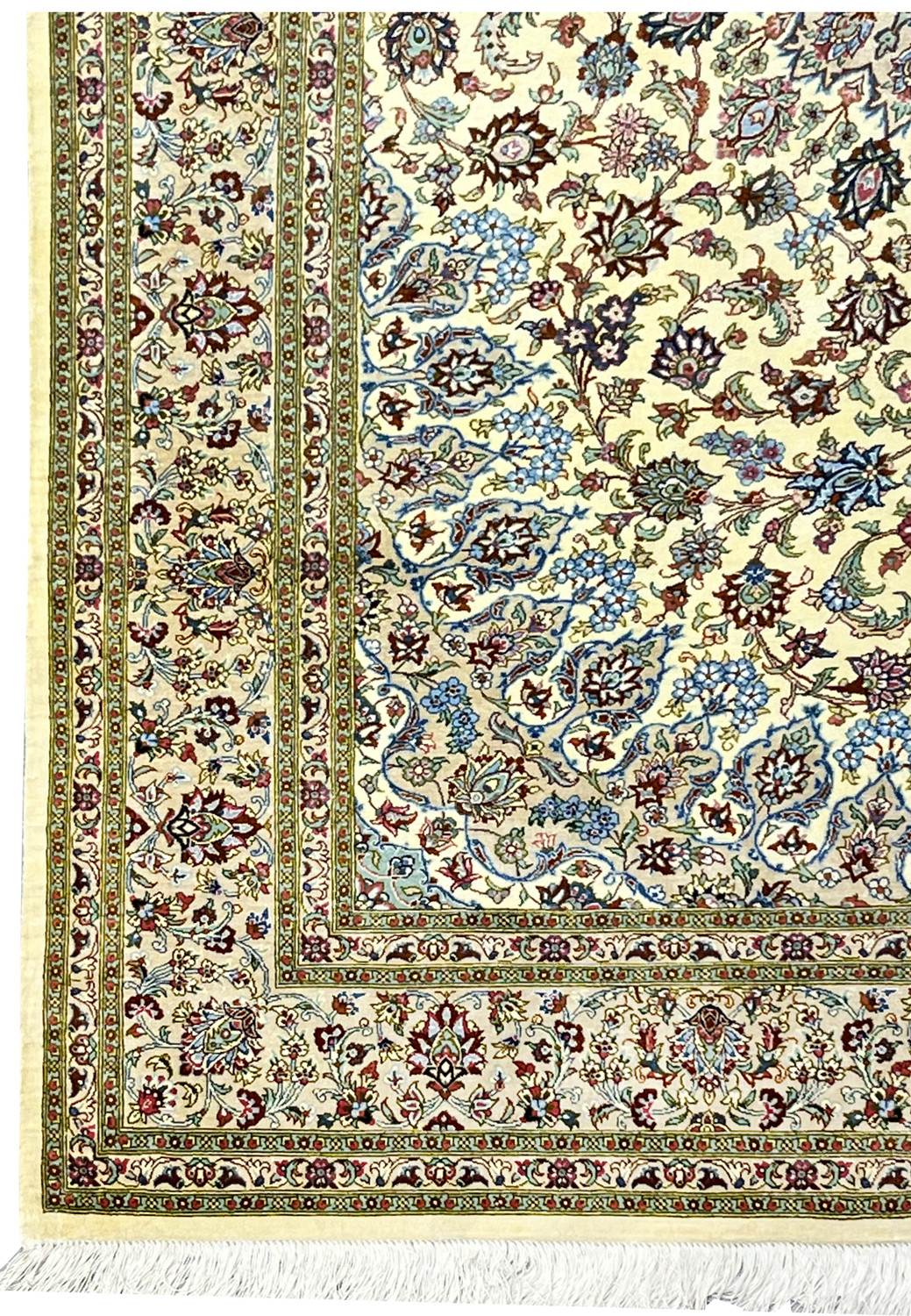Detailed border view of a signed Persian Qum silk rug featuring continuous floral cartouches, precise outlines, and harmonious color balance along the ivory frame.