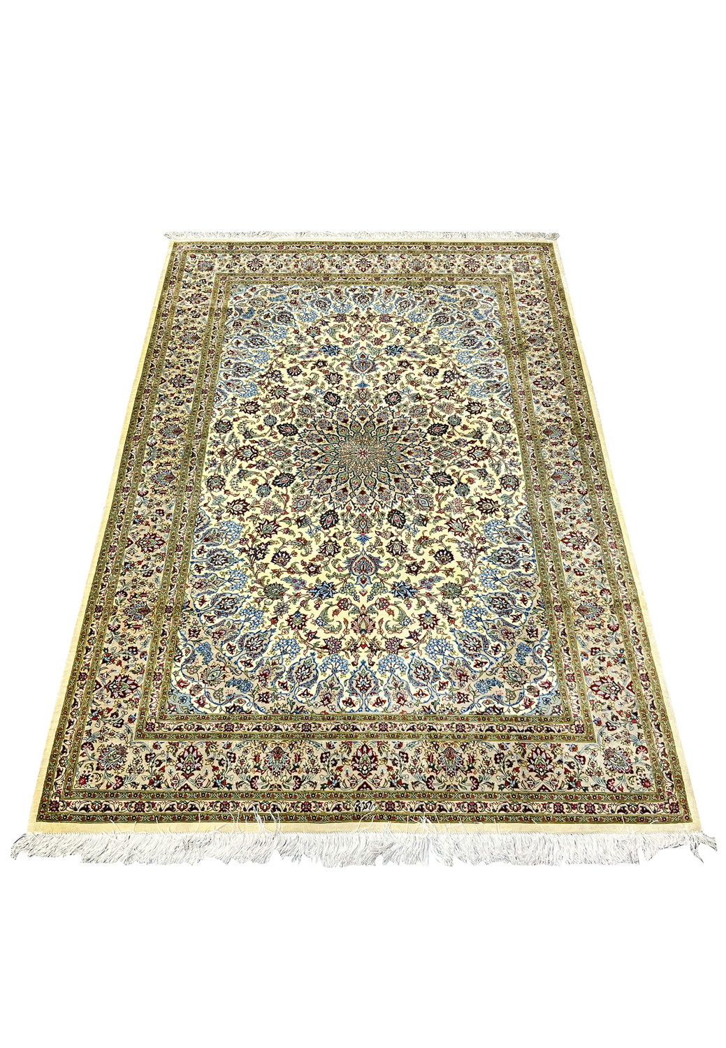 Laid-down view of a signed Persian Qum silk rug measuring 4'5 x 6'7, showcasing luminous ivory tones, dense floral detailing, and precise hand-knotted craftsmanship.