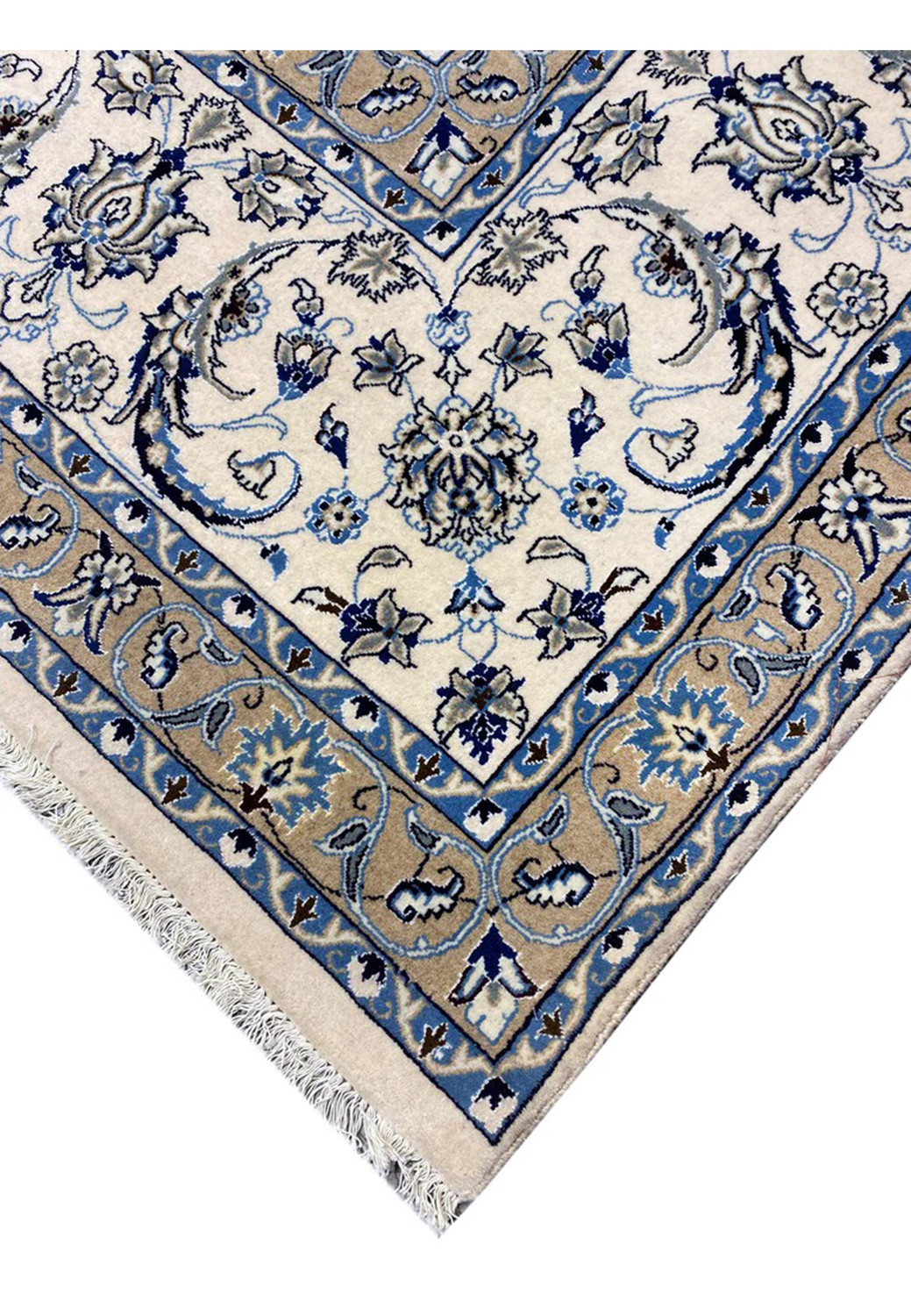 Edge view of a rare 10x19 Persian Nain 9 La rug highlighting crisp borders, ivory and blue floral patterns, and fine wool craftsmanship