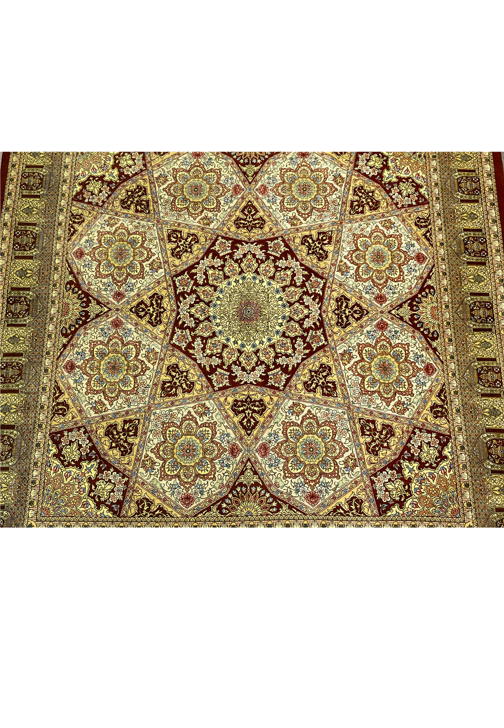 Central medallion detail of signed Amjadi Persian Qum silk rug highlighting star geometry, floral rosettes, and crisp silk knot precision