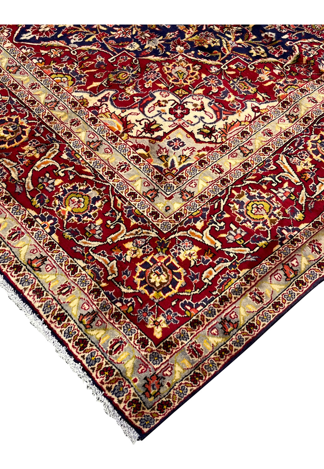 Edge detail of Persian Isfahan rug showing clean finishing, firm structure, tight weave, and well-preserved wool pile along the border