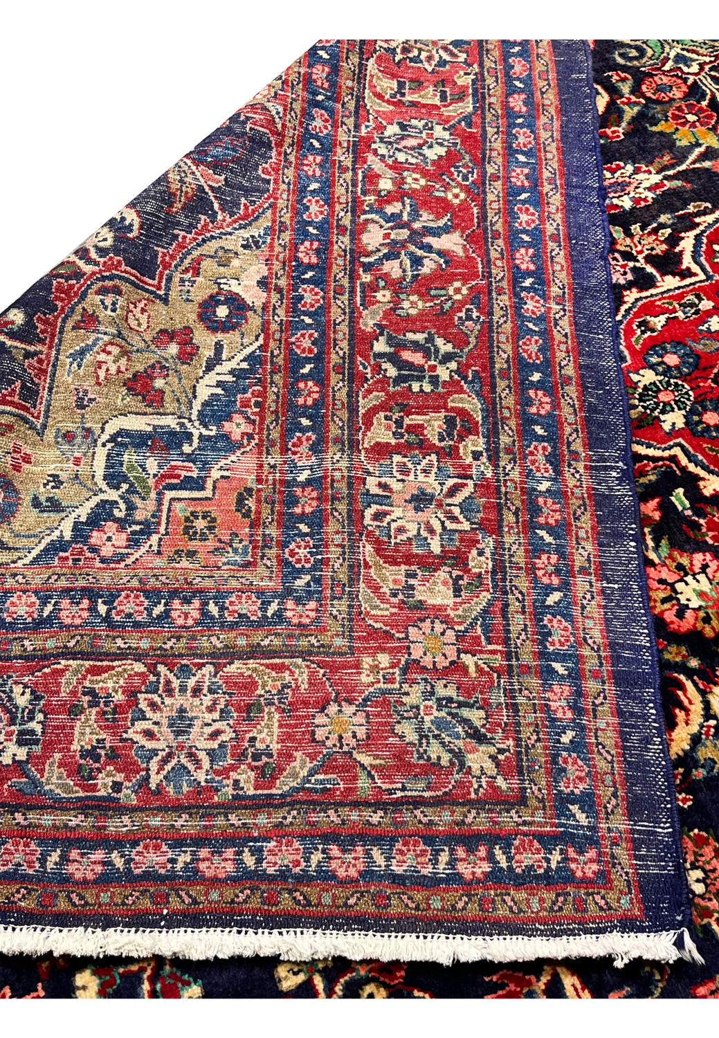 Backside of handmade Mahal rug showing clear knot definition, color transitions, and sturdy cotton foundation confirming handwoven quality