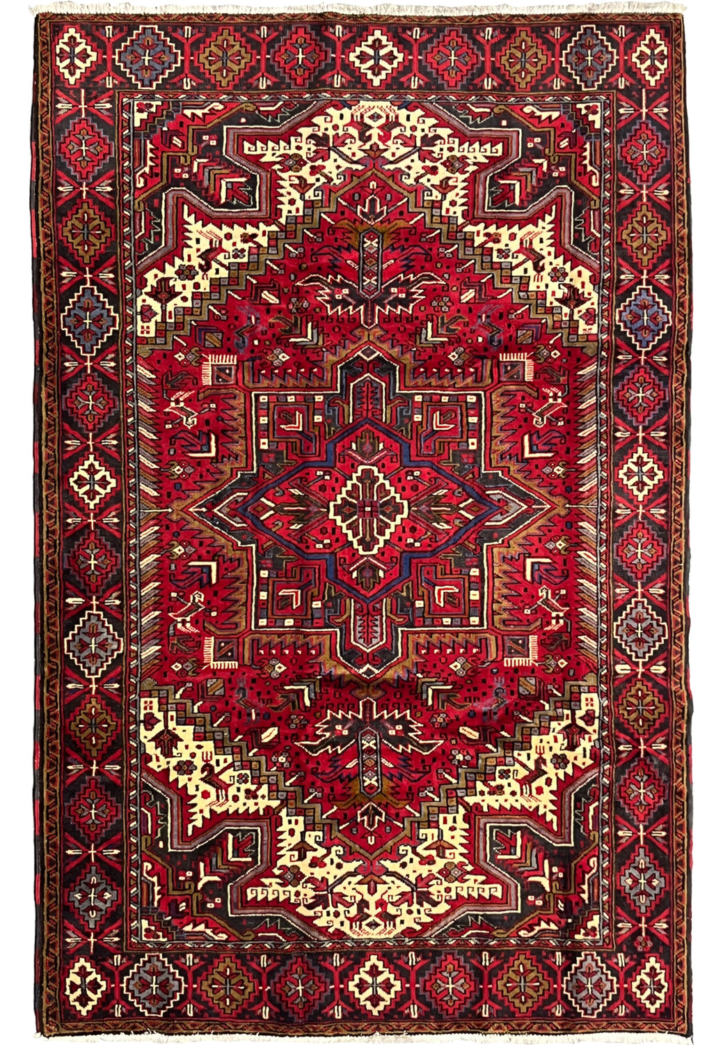 Persian Heriz geometric tribal rug full view 6.4 x 10.1 hand knotted wool with bold medallion angular motifs and strong border layout