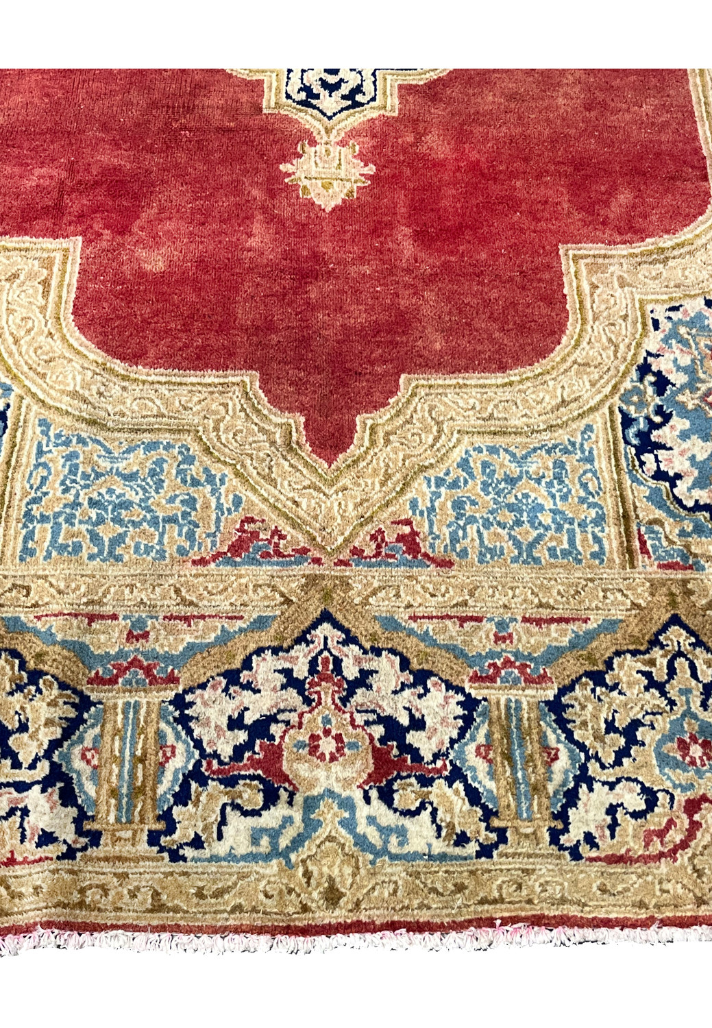 Lower border closeup Persian Kerman rug ivory floral guard borders blue and gold details distressed antique character