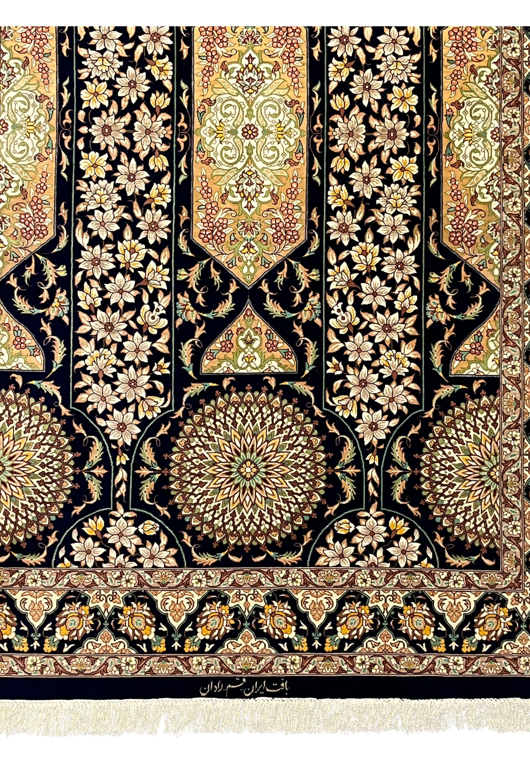 Lower border detail with scrolling palmettes rosettes and navy framing ivory and gold silk design on signed Persian Qum silk handmade rug